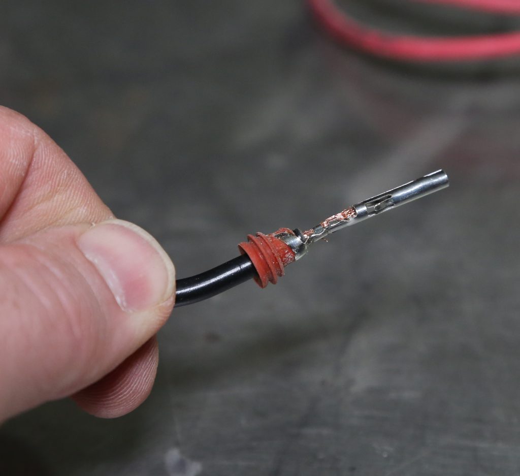 connector pin crimped on a single electrical wire