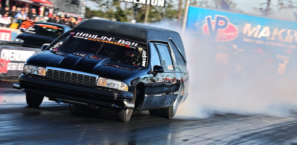chevy hearse on a dragstrip
