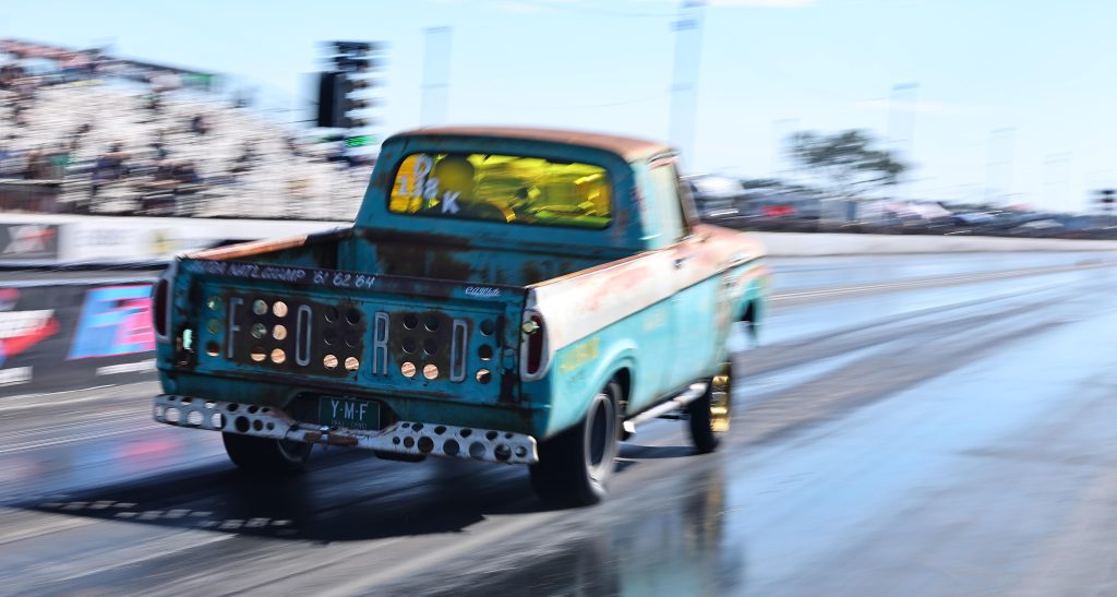 ford truck launching at drag strip