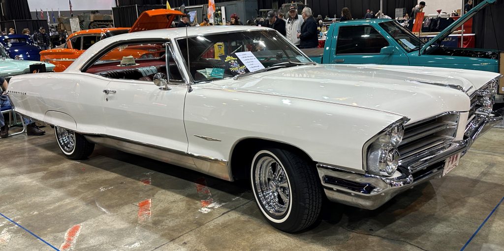 white 1965 Pontiac Bonneville coupe