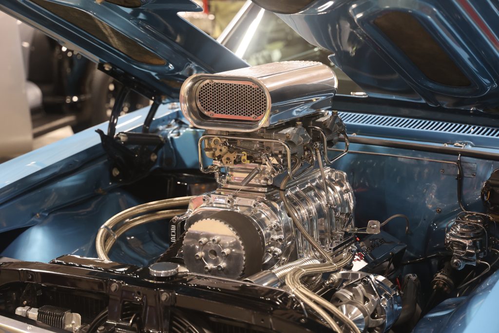 blower on a supercharged v8 engine in a vintage muscle car