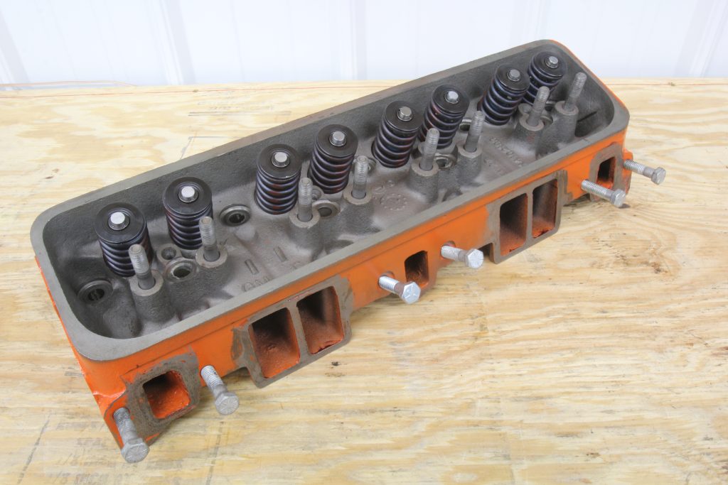 SBC Chevy cylinder head on a table
