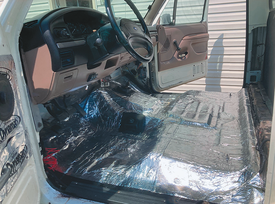 truck cab wrapped in sound deadening material
