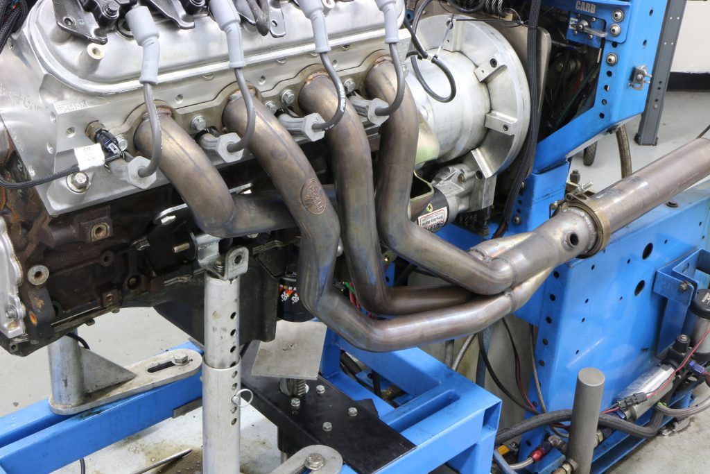 Close up of headers on an ls engine on dyno
