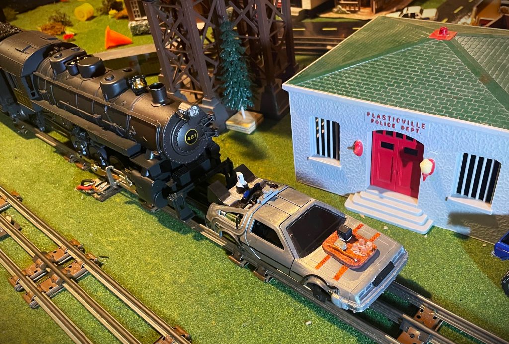 model train pushing delorean from back to the future 3