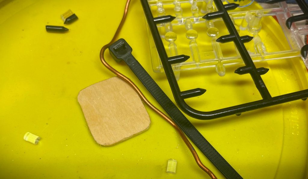 small model parts arranged on a table