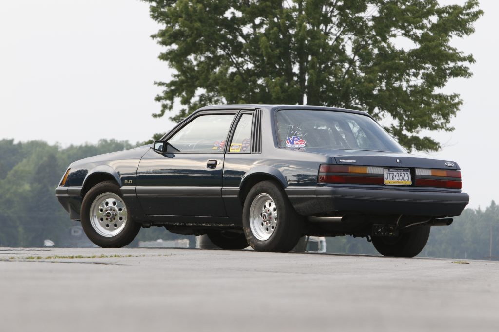 rear view of a foxbody ford mustang drag car