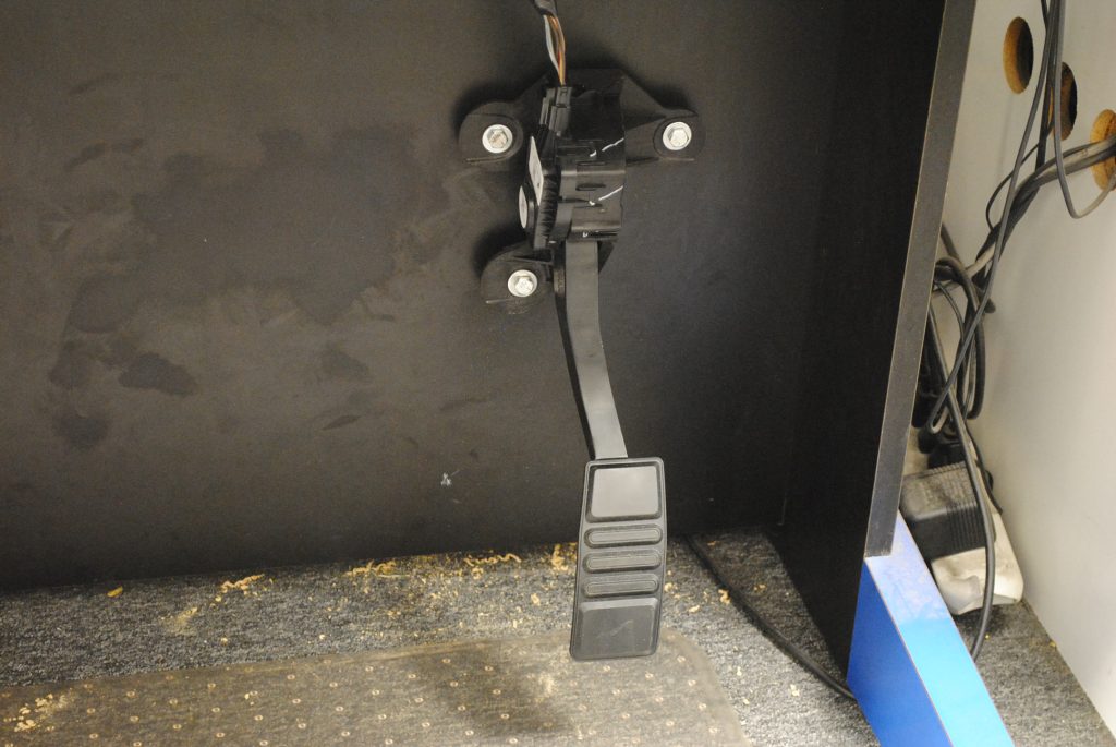 ford coyote v8 throttle pedal mounted on dyno bulkhead