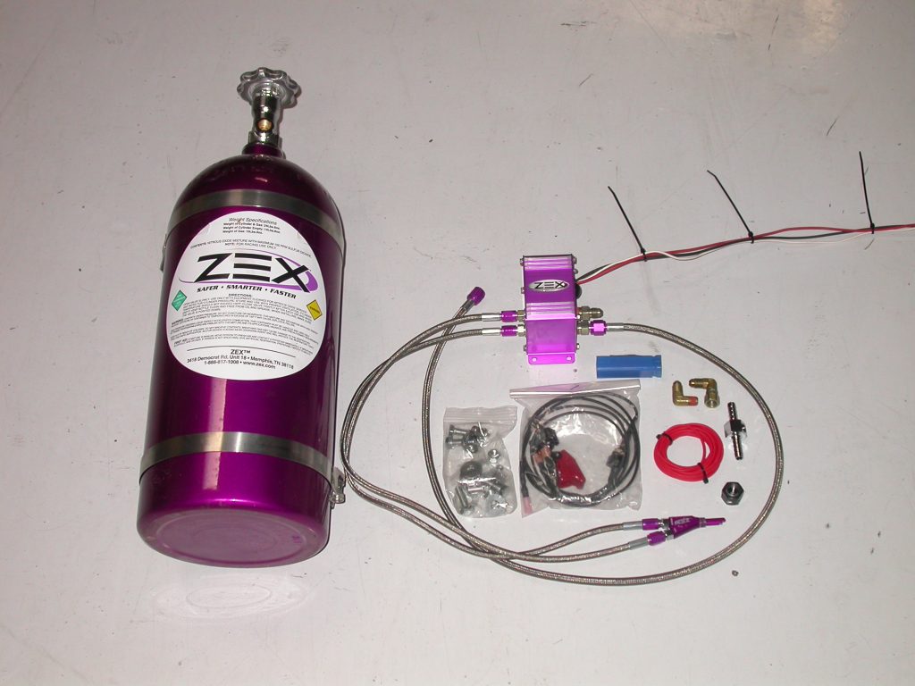 Zex Nitrous system components on floor