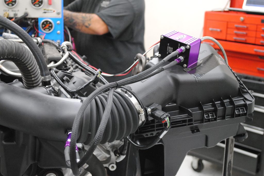 zex nitrous plumbing installed on a Coyote V8