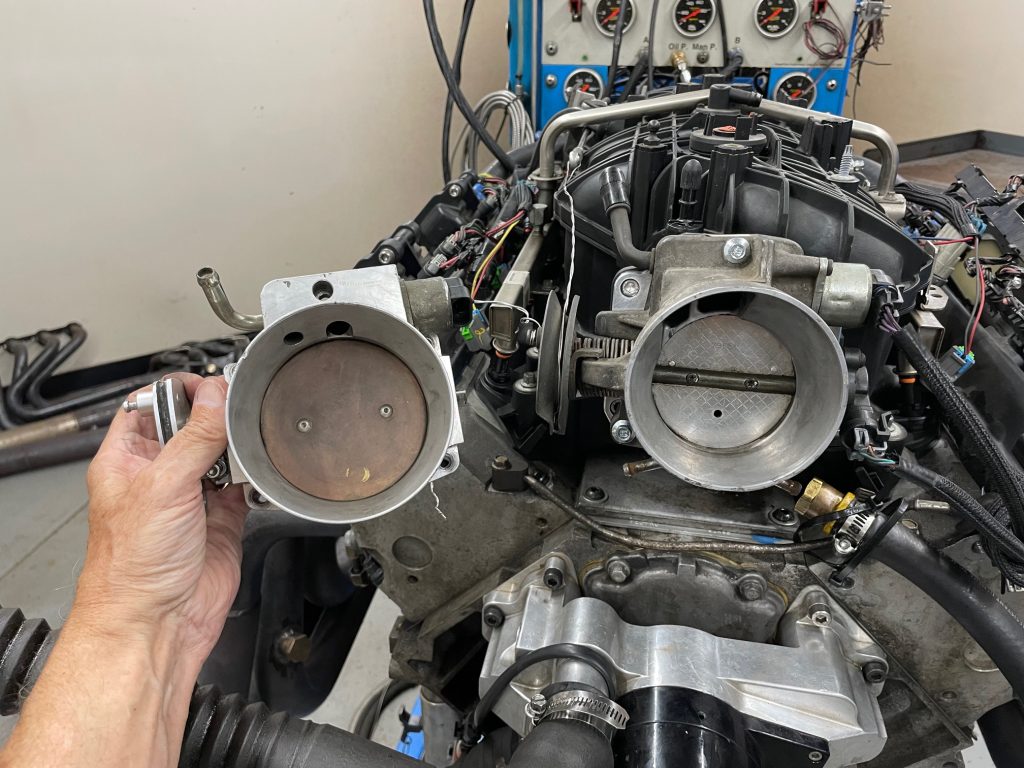 comparing 2 throttle bodies side by side