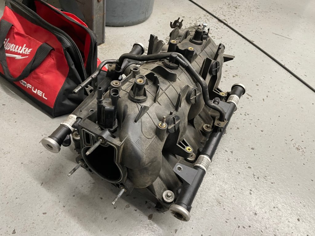 ls engine intake manifold resting on floor