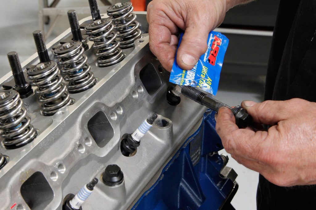 using thread lube on a cylinder head bolt