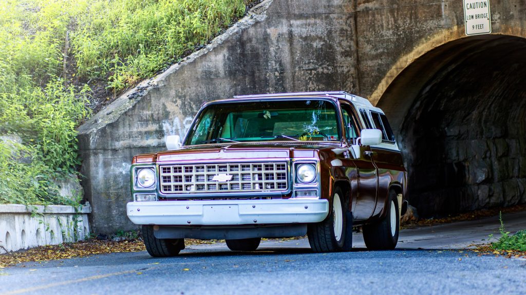 old truck near a country road tunnel