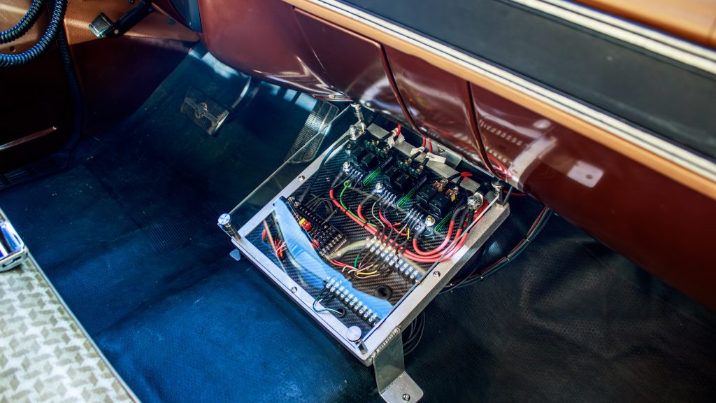 relay and electronics wiring panel in a vintage truck