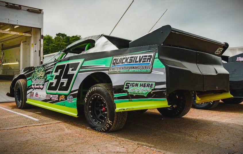 circle track race car with quicksilver livery