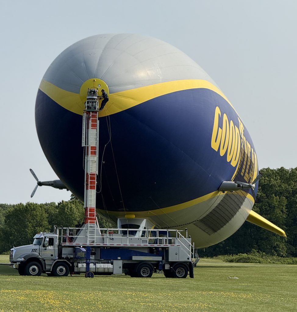 Goodyear Blimp Docked at Mobile Truck Boom