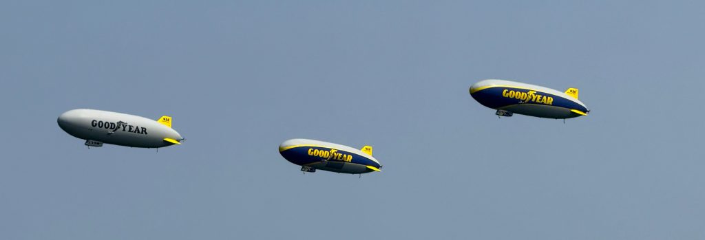 three goodyear blimps aloft over Akron Ohio