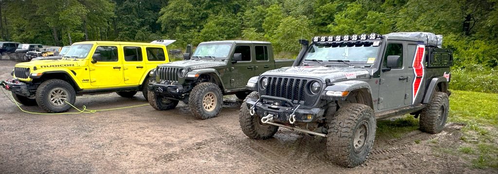 jeeps parked at muster point for an off road trail expedition