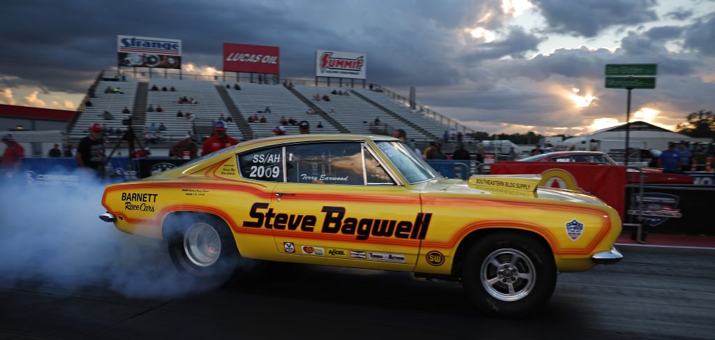 Plymouth barracuda nostalgia drag car doing burnout