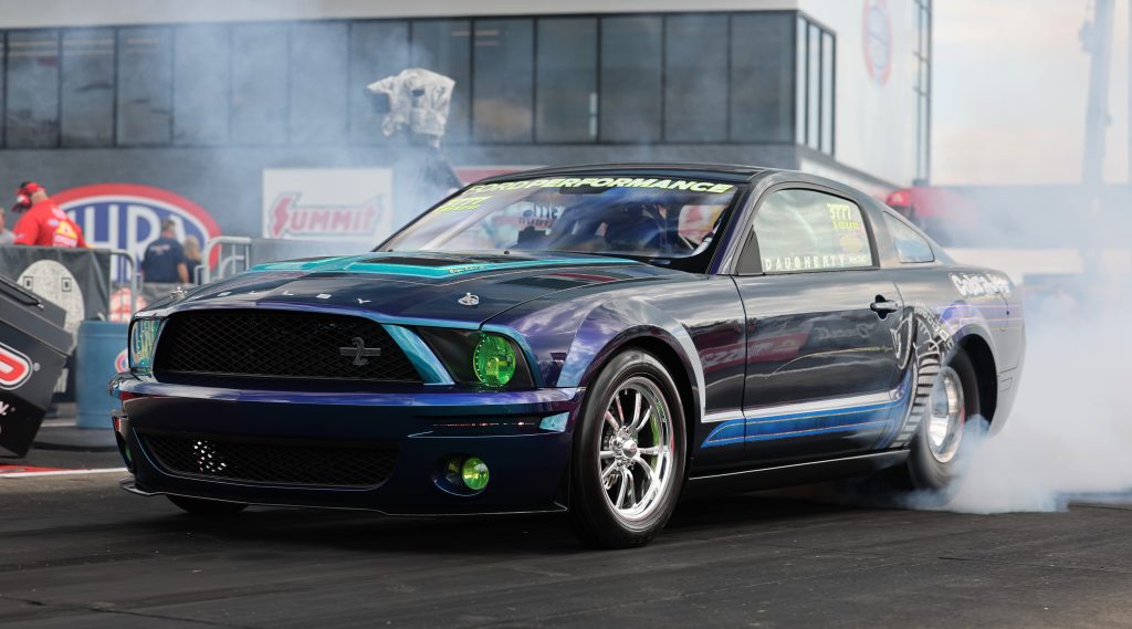 late model shelby mustang drag car during burnout