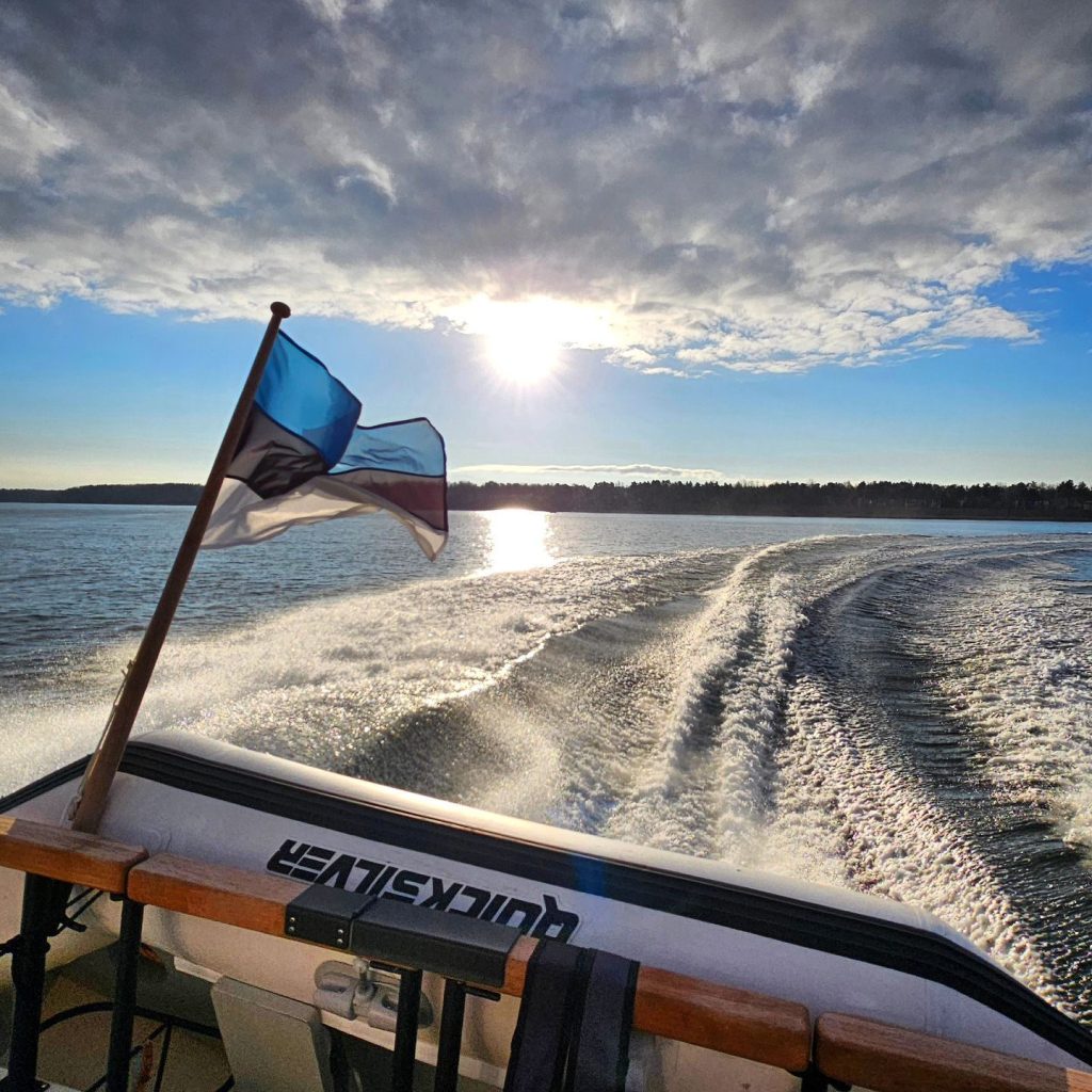 view off transom of powerboat with wake behind