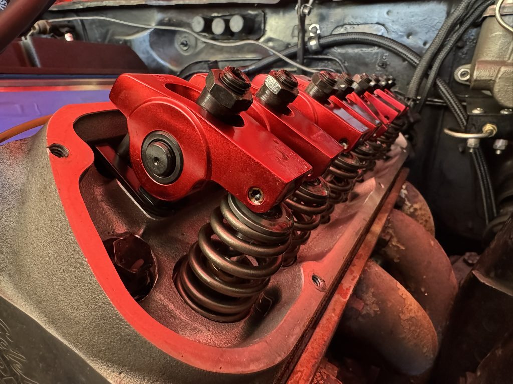 long row of cylinder head rocker arms