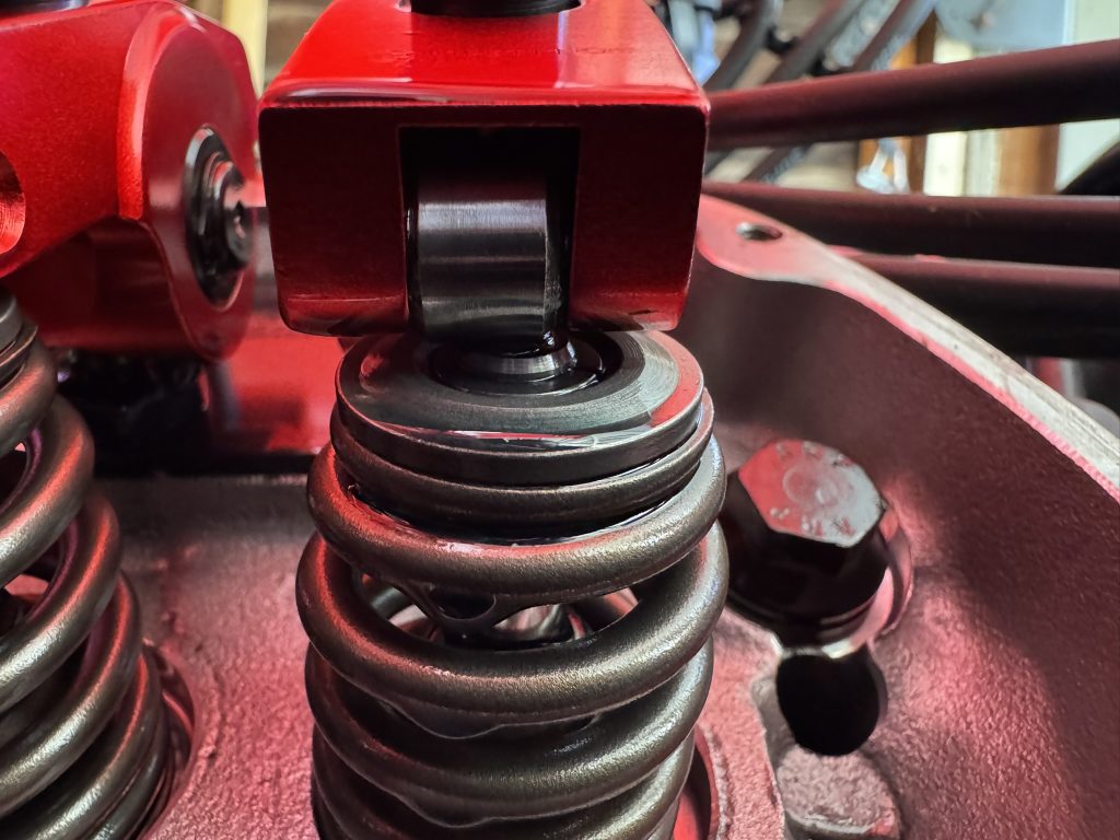 close up of the tip of a valve & spring