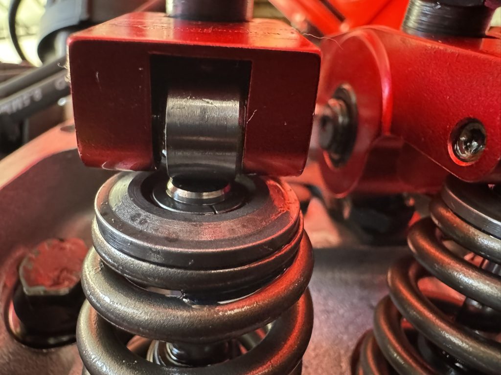tip of a valve under a roller rocker arm