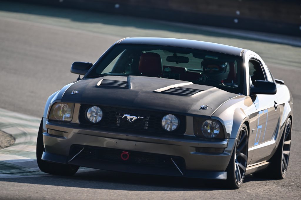 s197 ford mustang on a race track