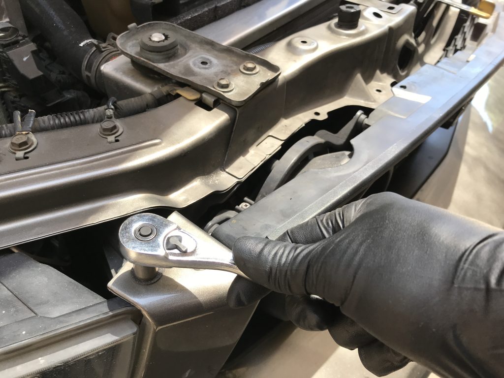 wrench removing Mustang grille