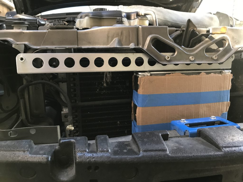 Mustang radiator with oil cooler mount installed