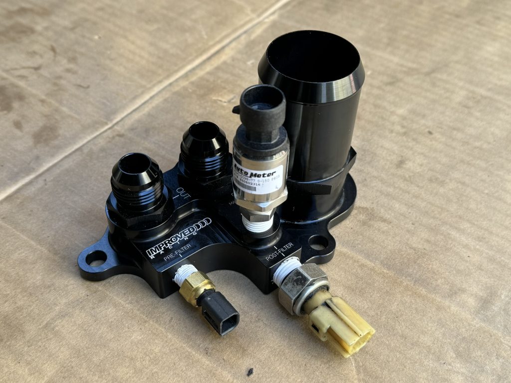 oil cooler plumbing bracket with fittings