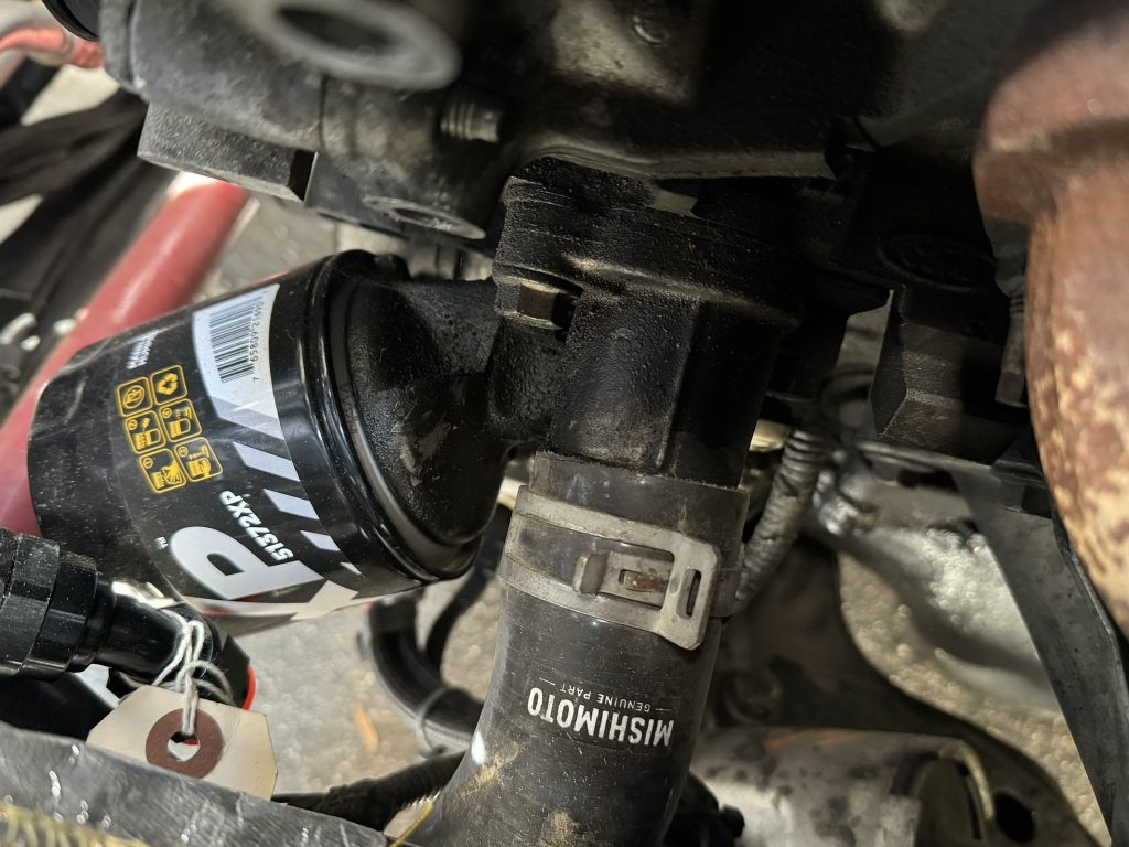 oil filter relocation bracket installed