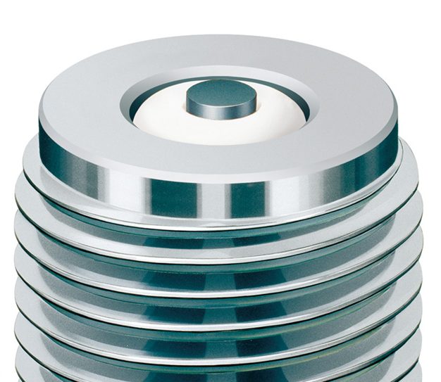 close up of a surface discharge spark plug tip