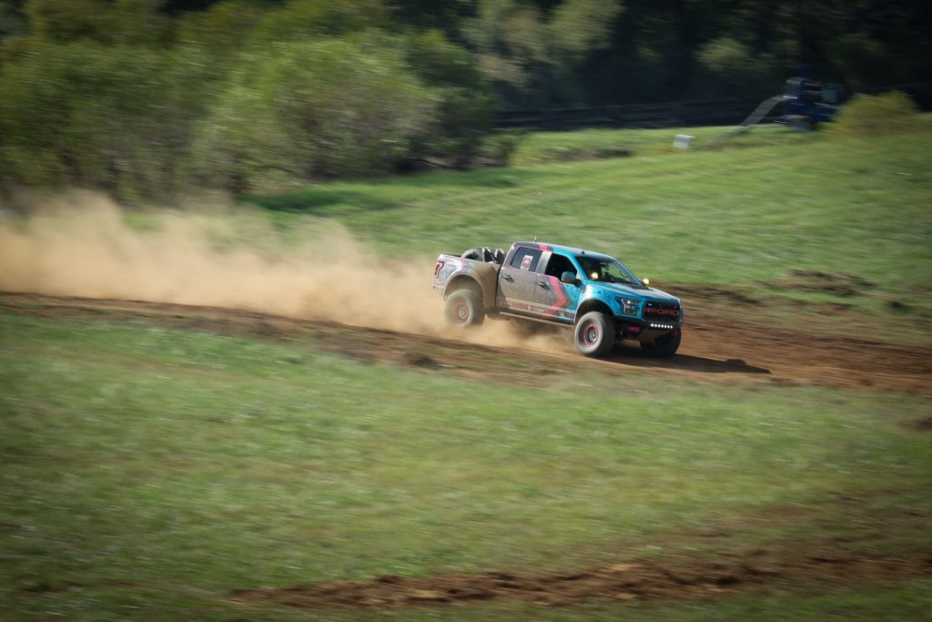 ford raptor trophy truck entering turn