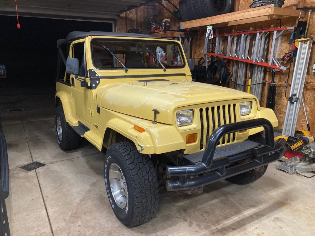 Jeep YJ Wrangler in Garage