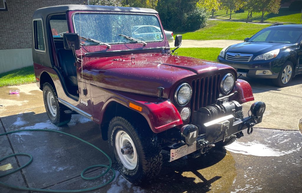 Old Jeep Getting Washed
