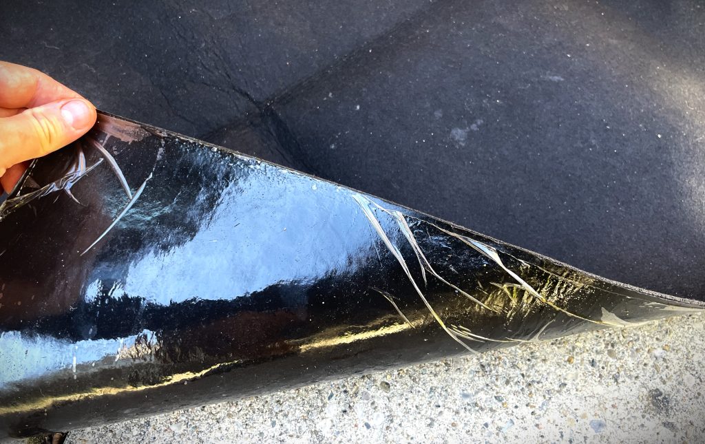 underside of an oil change mat