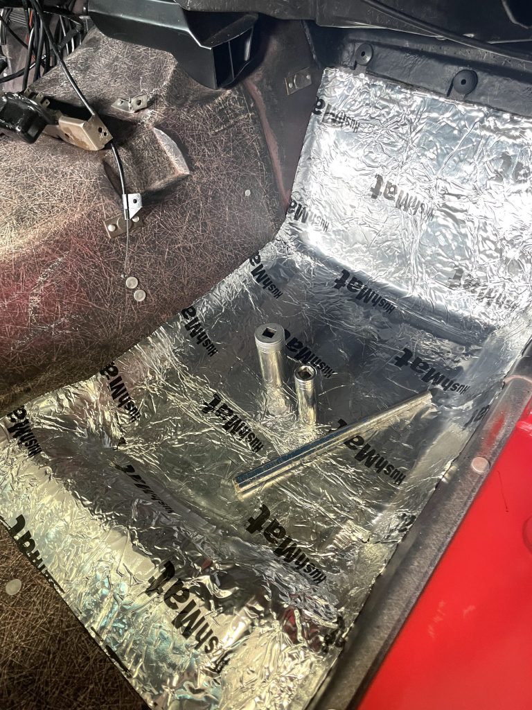 Removing wrinkles from HushMat floor insulation in C3 Corvette