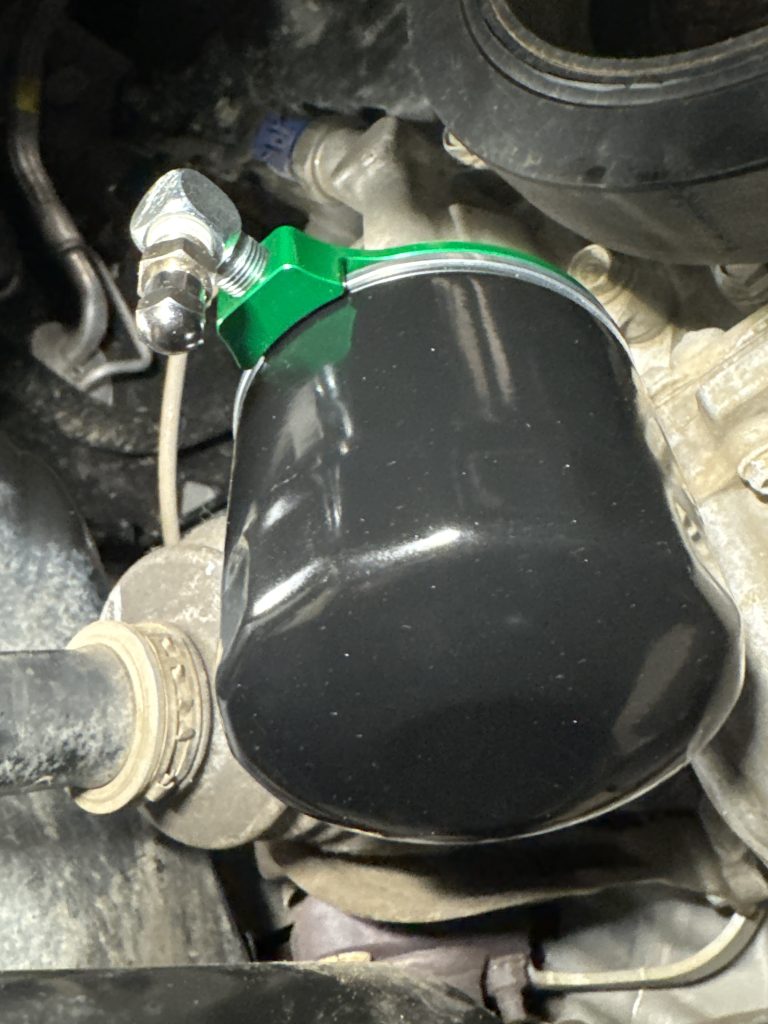 Baxter Evac-U-Filter adapter with oil filter installed