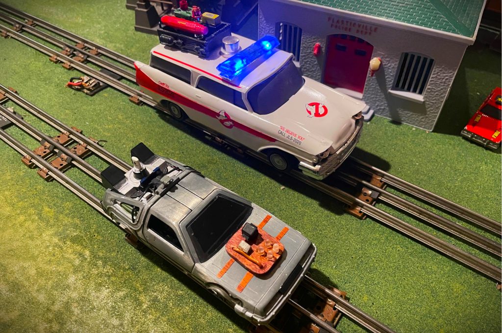 ghostbusters ECTO-1 model car with DeLorean Time Machine