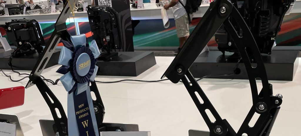 Hood hinges on display