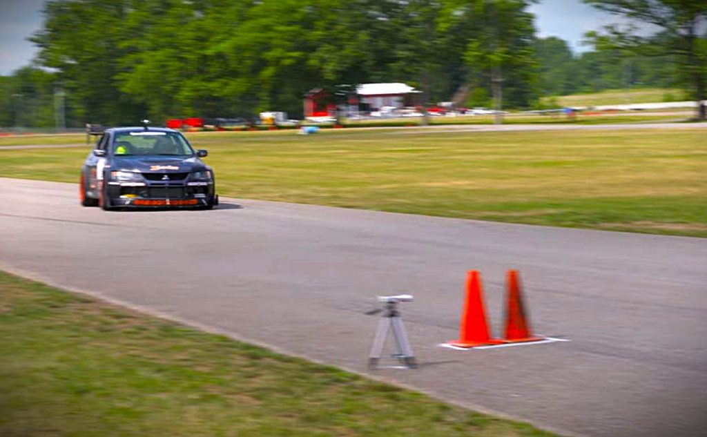 Autocross car racing towards finish line