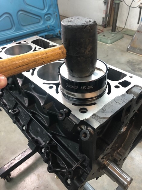 Installing piston and rod assembly