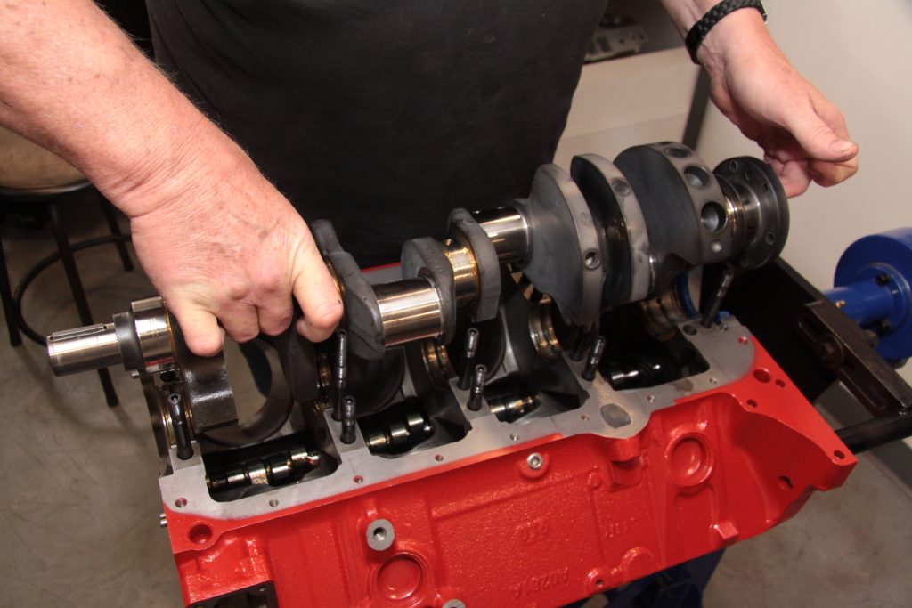 Lowering crankshaft into engine block
