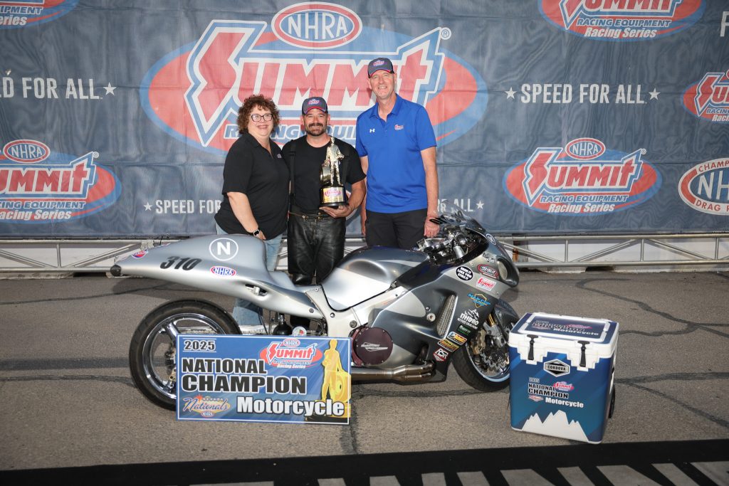 Summit Racing ET Motorcycle winner Michael Schmalle with trophy