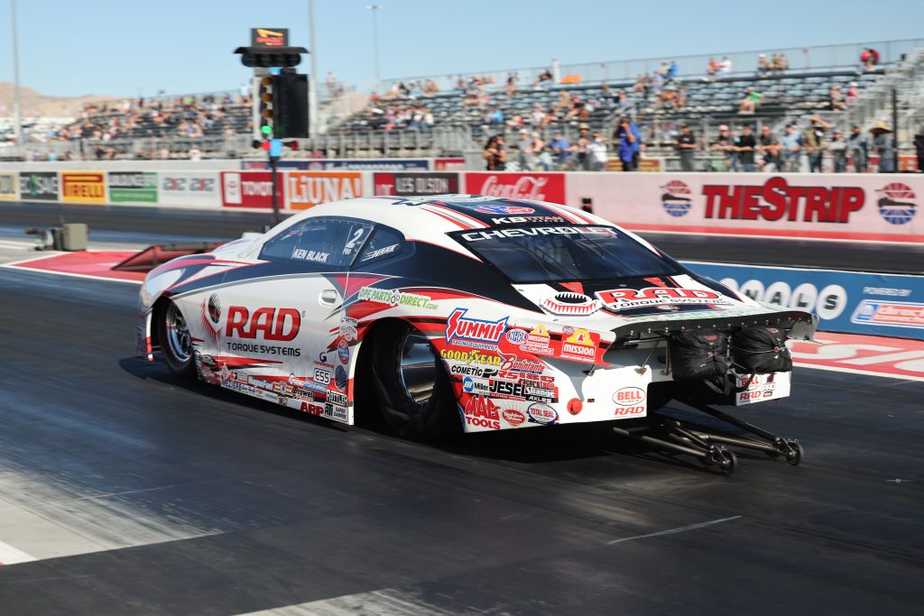 Rear view of dallas glenn's pro stock drag car on track