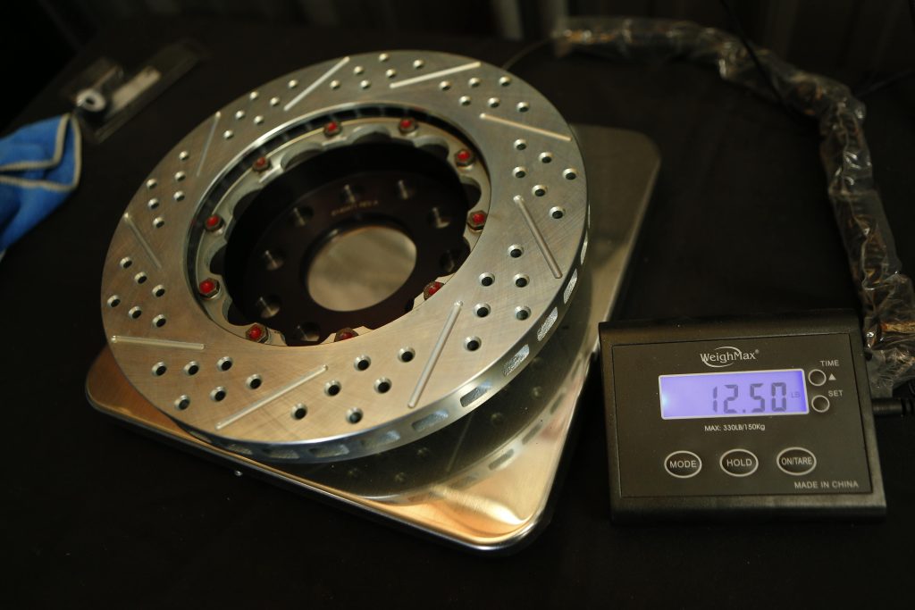 new brake rotor placed on a weight scale