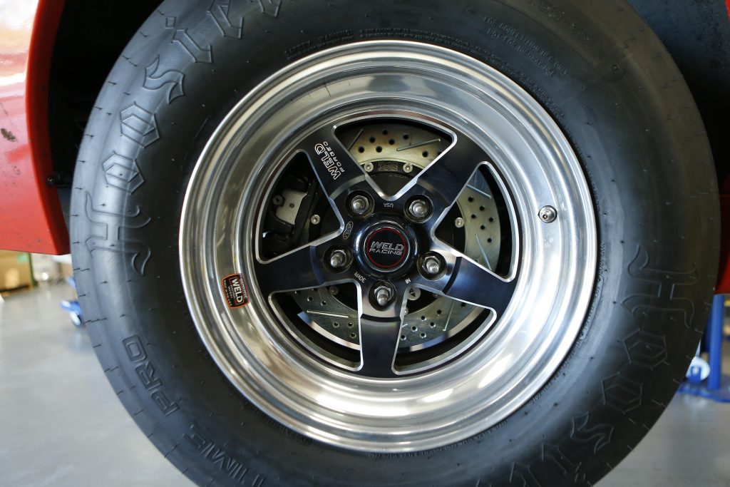 close up of weld wheel on rear of a drag car